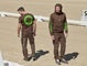 Zwei Männer in brauner Arbeitskleidung mit grünen Aufdruck von engelbert strauss. Kollektion e.s. motion 2020.